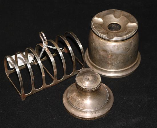 Silver toast rack, inkwell and ashtray